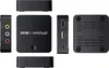 Multiple views of a black ezcap VHSDigi2 device arranged around a central view. Náhled obrázku produktu