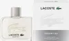 A bottle of Lacoste Essential Eau de Toilette and its packaging are shown side-by-side against a white background. Anteprima dell’immagine prodotto