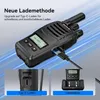 A walkie-talkie is shown being charged via a USB-C cable, with additional inset images showing the charging port and a charging station. Produktbild-Vorschau