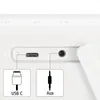 Close-up of the ports on a white electronic device, with diagrams of USB-C and Aux connectors. Anteprima dell’immagine prodotto