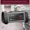 A car battery charger is shown in a close-up shot, with a blurred background of vehicles. Produktbild-Vorschau