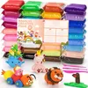 A collection of colorful modeling clay packs and several clay creations, including a potted plant, a bear, a caterpillar-like toy, and a lion. Náhled obrázku produktu
