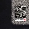 A close-up view of the anti-slip bottom of a rug, showing the textured pattern and text. Produktbild-Vorschau