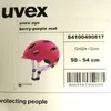 A product shot of a pink helmet with branding and size information. Náhľad obrázku produktu