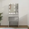 A vanity table with a lighted mirror and shelves against a plain wall. Náhled obrázku produktu
