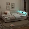 A bedroom scene with a bed, pillows, and wall art. Anteprima dell’immagine prodotto