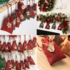 A collage of four images showing red fabric gift bags with wooden ornaments and numbers, arranged in different festive settings. Produktbild-Vorschau