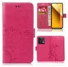 A collage of images showing a pink phone case with a floral and butterfly design, including a view of the case open with cards and a phone inside, and a view of the back of the case. Produktbild-Vorschau