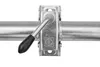 A close-up of a metal clamp with a black handle attached to a metal tube. Produktbild-Vorschau