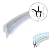 A close-up view of a clear, curved shower door seal with water droplets, alongside a diagram showing its dimensions. Podgląd zdjęcia produktu