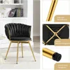 A black velvet chair with gold legs is shown in a room with a bookshelf in the background. The image is divided into sections highlighting different features of the chair. Produktbild-Vorschau