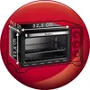 A close-up marketing image of a red Moulinex oven with dimensions indicated. Voir les images du produit