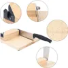 A collage of images showing a wooden bread slicer with a knife, close-ups of its components, and a ruler marking. Náhled obrázku produktu