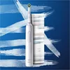 A white electric toothbrush and its travel case are displayed against a blue background with white brush stroke-like graphics. Produktbild-Vorschau