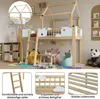 A children's loft bed with a house-like roof structure, set up in a playroom with toys and decorations. Anteprima dell’immagine prodotto