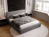 A modern bedroom with a gray upholstered bed as the focal point. Produktbild-Vorschau