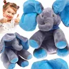 A collage of images featuring a plush elephant toy and a happy child giving a thumbs up. Anteprima dell’immagine prodotto