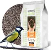 A bag of birdseed with a bird in the foreground and a close-up of hands holding seeds. Produktbild-Vorschau