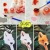 A collage of images showing paint-by-numbers supplies and finished artwork of foxes. Produktbild-Vorschau