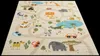 A children's rug with a safari theme, featuring cartoon animals and cars on a road network. Produktbild-Vorschau