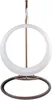 A hanging chair with a circular frame and a stand. Produktbild-Vorschau