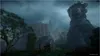Two people stand in a lush, overgrown jungle clearing, looking towards a massive, ancient stone statue of a creature. The sky is dark and stormy, with rain falling. Náhled obrázku produktu