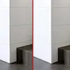 A split image showing a before and after of a corner with white tiled walls and a dark wood-like step. Anteprima dell’immagine prodotto