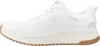 Side view of a white athletic shoe with a brown sole. Anteprima dell’immagine prodotto