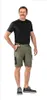 A man is standing and posing for a product shot, wearing the shorts. Produktbild-Vorschau