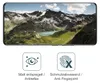 A smartphone screen displaying a mountain landscape, with icons and text below describing product features. Produktbild-Vorschau