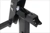 A close-up view of a black metal table leg mechanism with silver pins. Voir les images du produit
