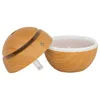 A humidifier with a wood-grain finish is shown with its lid removed. Podgląd zdjęcia produktu