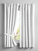 A white curtain is tied back with a fabric tie on the left side, revealing a window with greenery and a vase with branches. Produktbild-Vorschau