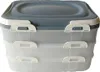A three-tier food storage container with a gray lid and white latches, set against a white background. Produktbild-Vorschau