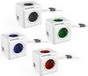 Four white power cubes with different colored outlets are arranged in a grid on a white background. Produktbild-Vorschau