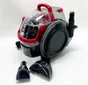 A carpet cleaner with accessories on a white background. Voir les images du produit