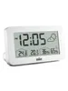 A white digital alarm clock with a weather station display is shown against a white background. Produktbild-Vorschau