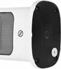 The bottom and side of a white ceramic heater are shown against a white background. Voir les images du produit