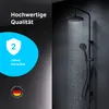 A black shower system with water flowing from the showerhead and hand shower, set against a dark background. Text overlays highlight quality and warranty. Produktbild-Vorschau