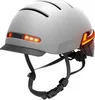 A gray smart helmet with orange LED lights. Náhled obrázku produktu