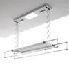 A ceiling-mounted automatic clothes drying rack with an integrated light. Produktbild-Vorschau