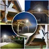 A collage of images showing a black LED floodlight with a motion sensor installed on a wooden structure, illuminating a carport and driveway at night. Náhled obrázku produktu