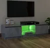 A modern TV stand with a built-in DVD player, illuminated by green LED lights, positioned in front of a wall-mounted television. Produktbild-Vorschau