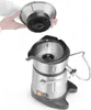 A person is holding the top part of a juicer over the base of the juicer. Náhled obrázku produktu