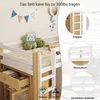 A loft bed with drawers and a cabinet, shown in a child's room setting with decorative elements on the wall. Voir les images du produit