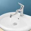 A chrome faucet with an articulated arm is attached to a white sink, with water running into the sink. Podgląd zdjęcia produktu