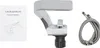 A product shot showing a faucet, a user manual, and hoses on a white background. Podgląd zdjęcia produktu