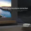 A projector is shown projecting an image onto a wall, with text describing its features. Náhled obrázku produktu