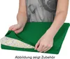 A person is shown partially, holding open a green cushion cover to reveal the inner filling. Produktbild-Vorschau