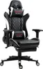 A black and white gaming chair with a footrest and adjustable armrests, shown from a front-side angle on a white background. Produktbild-Vorschau